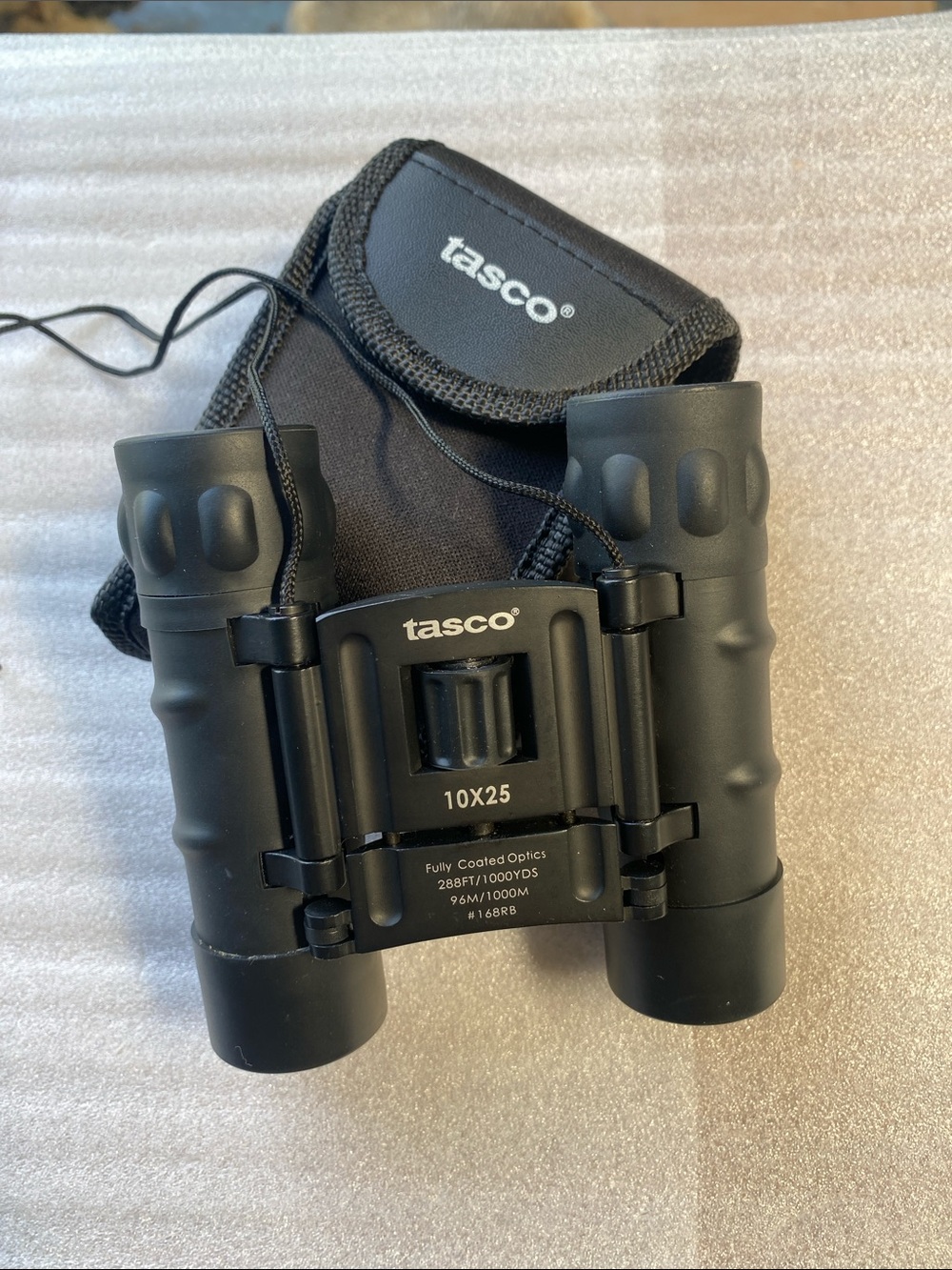 Tasco Essentials 10x25 Compact Roof Prism Binoculars with Original Carry Case